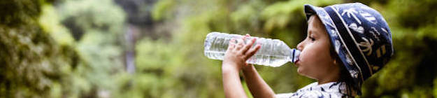 Child drinking from water bottle